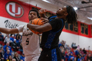 Top-ranked Mohigans show balance in taking down No. 7 University High, 66-40